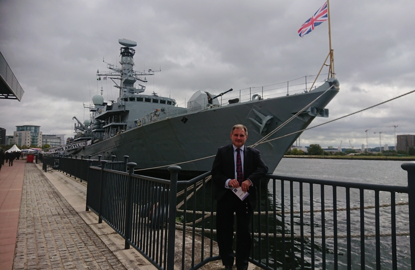 Jack Lopresti MP next to HMS Argyll, a Type 23 Frigate 