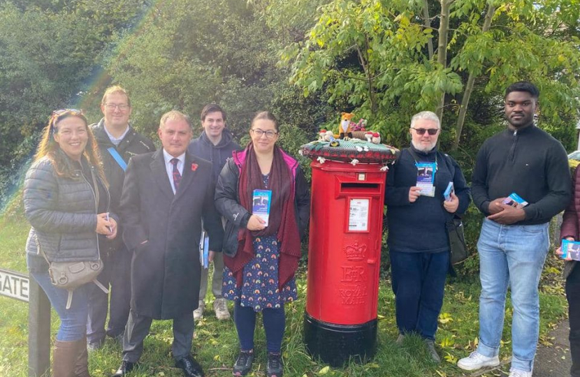 Jack with the Emersons Green Team besides a Post Box